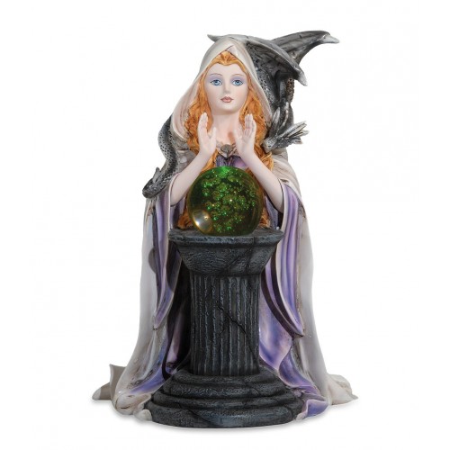 The witch in front of the capital with the ball. LED lamp.