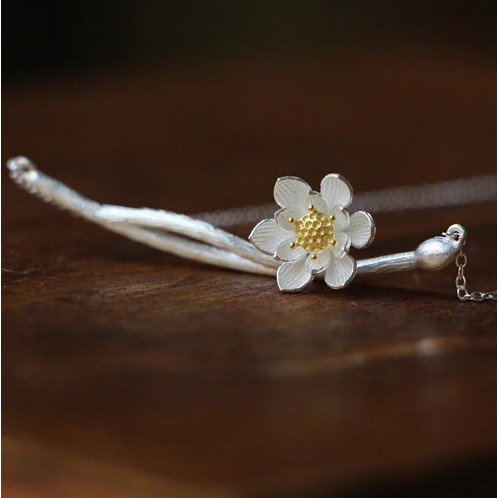 The pendant with blossom on branch