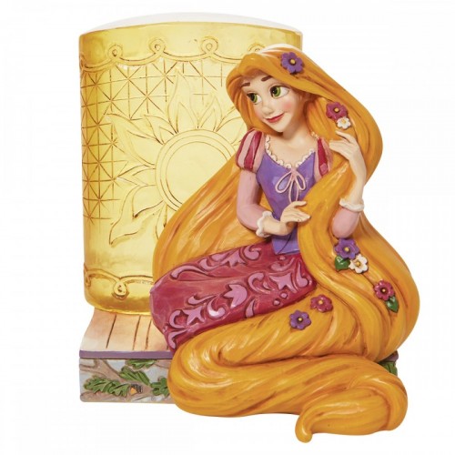 Rapunzel sitting with the lantern. (by Jim Shore)