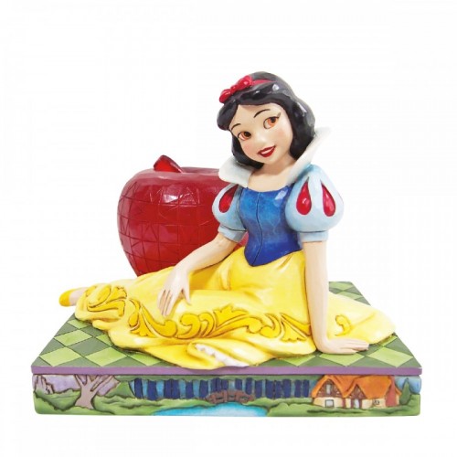 Snow White sitting with apple. (by Jim Shore)
