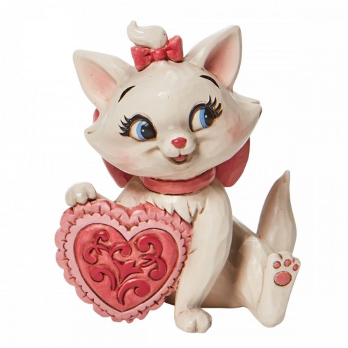 Minou (Marie) con il cuscino a cuore. (by Jim Shore)