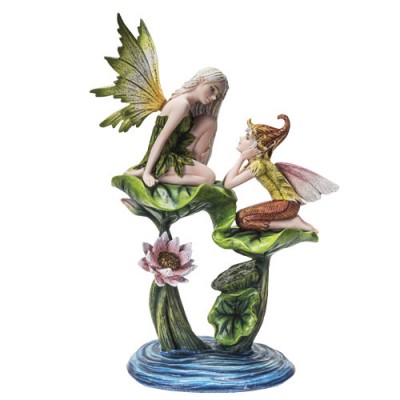 The fairy sitting on the leaf with the elf. The fairy sitting on the leaf with the elf.