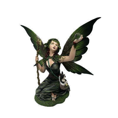 The fairy sitting with the ball in her hand and the green dress. The fairy sitting with the ball in her hand and the green dress.