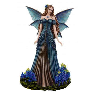 The fairy standing among the blue flowers. The fairy standing among the blue flowers.
