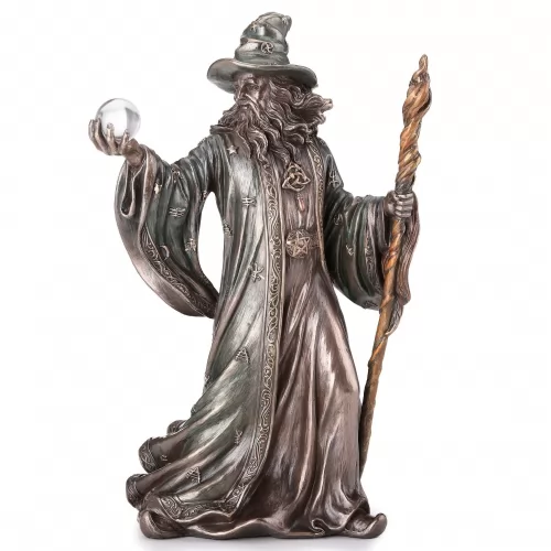 The sorcerer with the sphere and the staff.