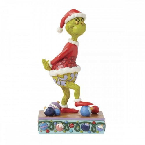 Der Grinch zerdrückt die Weihnachtskugel. (von Jim Shore)