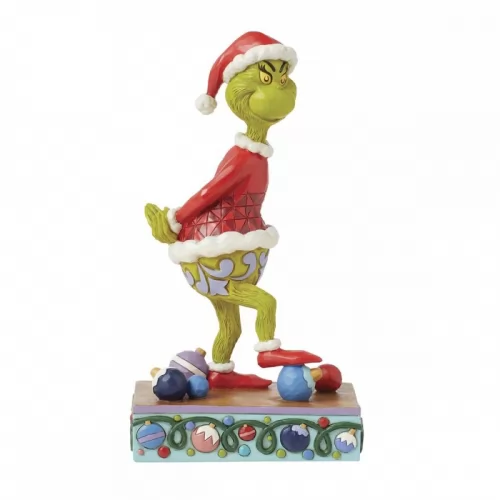 The Grinch crushing the Christmas ball. (by Jim Shore)