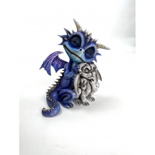 The baby dragon with the stuffed toy.