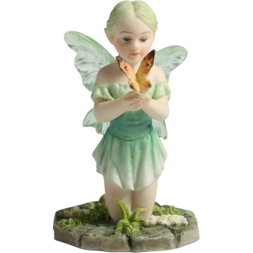 La fatina verde con la farfalla sulla mano.